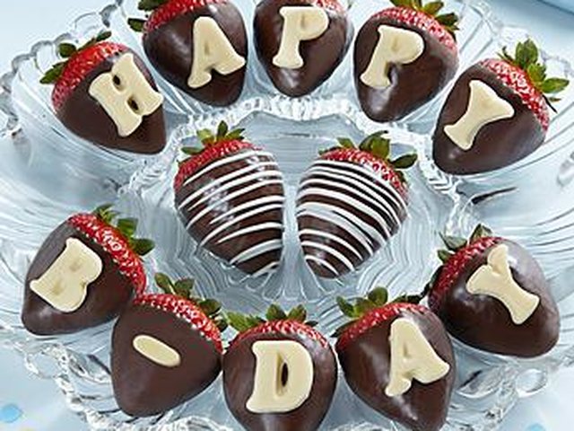 Chocolate-covered strawberries spelling Happy B-Day