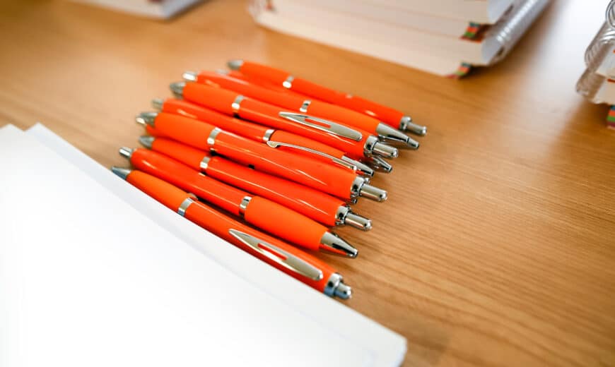 Pens and marketing advertising for business and company promotion, unfocused background and free space for text.