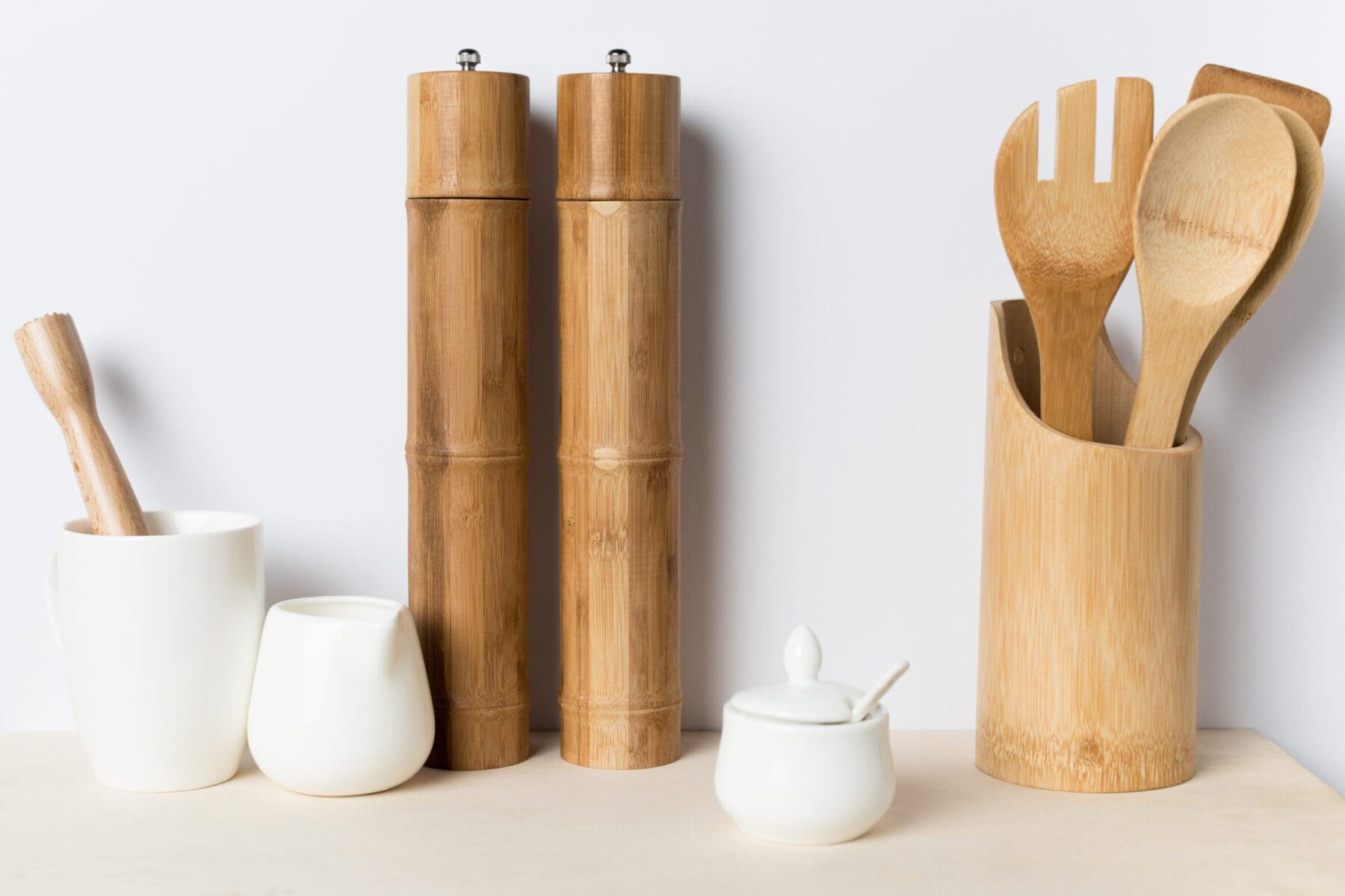 various wooden, ceramic and bamboo kitchen utensils
